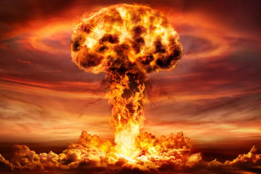 A massive mushroom cloud explosion dominates the sky amidst fiery clouds and intense lighting, symbolizing disaster.